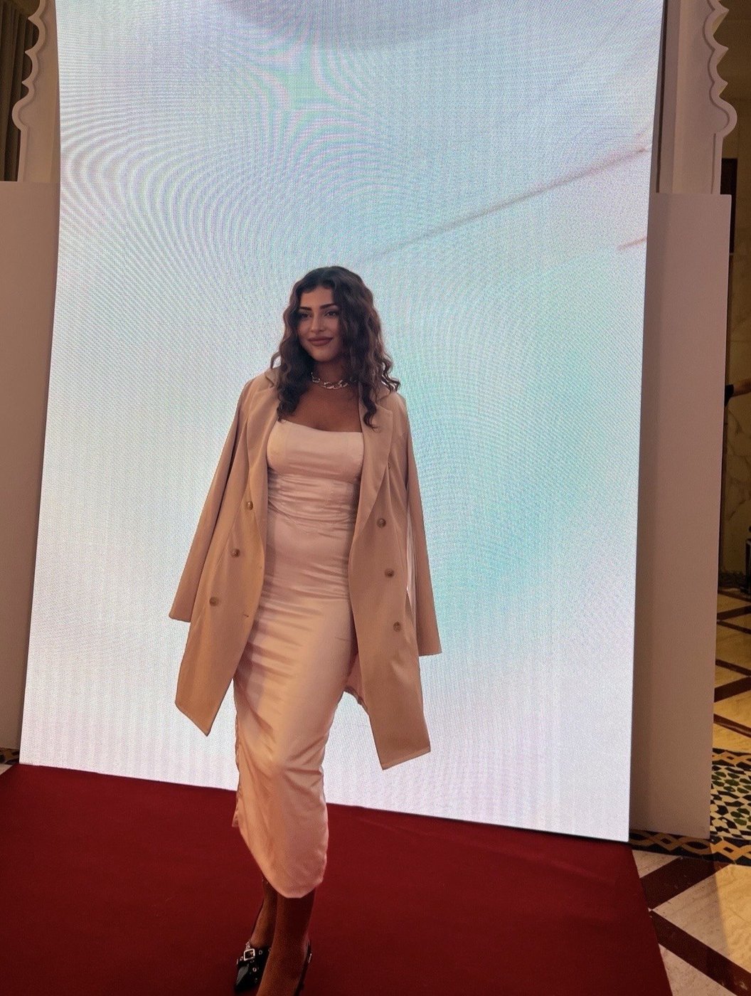 Portrait of Elle Liana, founder of AI Mini Stores
